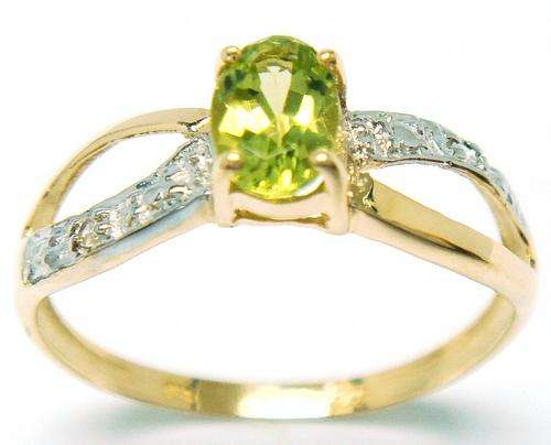 Beautiful solid 9kt gold and genuine peridot and diamond ring.