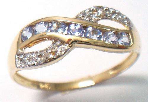 Beautiful solid 10kt gold and genuine tanzanite and diamond ring.