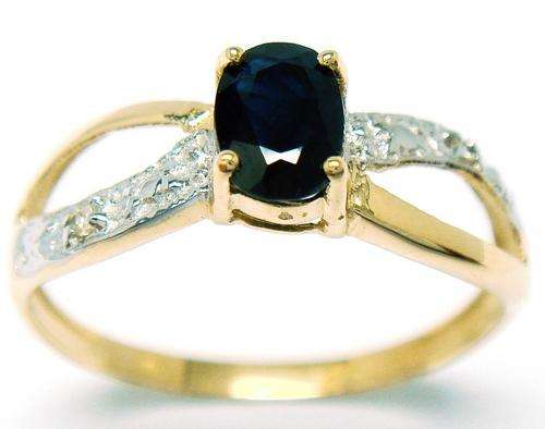 Beautiful solid 9kt gold and genuine black sapphire and diamond ring.