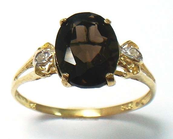 Beautiful solid 10kt gold and genuine smokey topaz and diamond ring.