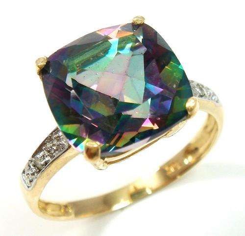 Beautiful solid 9kt gold and genuine mystic topaz and diamond ring.