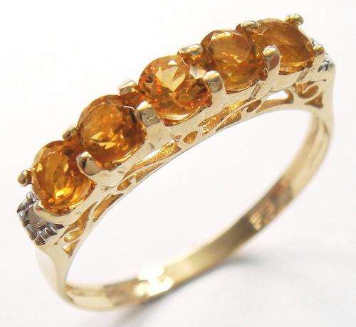 Beautiful solid 9kt gold and genuine citrine and diamond ring.