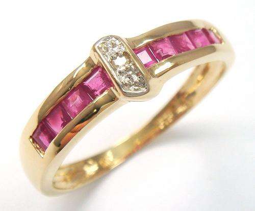 Beautiful solid 9kt gold and genuine ruby and diamond ring.
