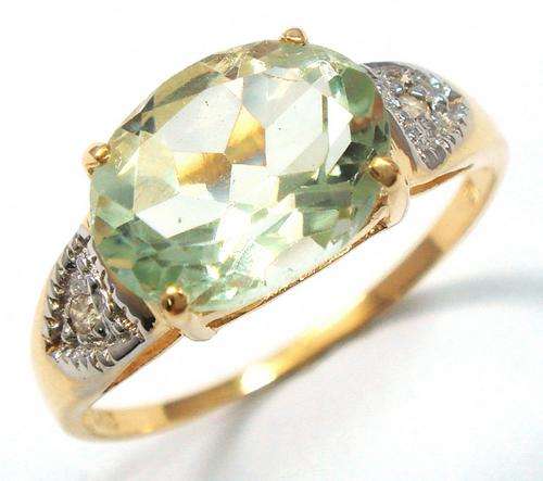 Beautiful solid 9kt gold genuine green amethyst and diamond ring.