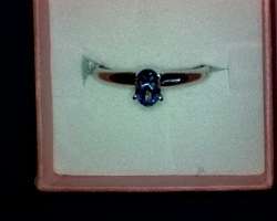 Stunning 0.5ct genuine tanzanite and 10kt white gold solitaire ring