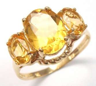 Stunning solid 9kt gold and genuine citrine ring.