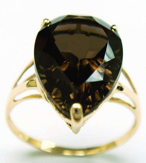 Beautiful solid 9kt gold and genuine smokey topaz ring.