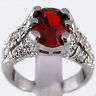 Beautiful 14kt white gold GP and simulated ruby ring.