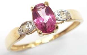 Beautiful solid 9kt gold and genuine pink topaz and diamonds ring.