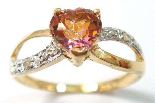 Beautiful solid 9kt gold and genuine yellow mystic topaz and diamond ring.
