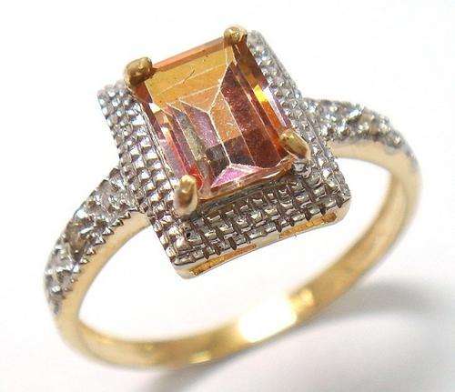 Beautiful solid 10kt gold and genuine yellow mystic topaz and diamond ring.