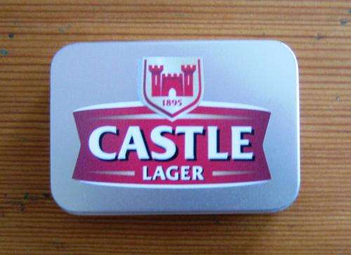 BRAND NEW "CASTLE LAGER" SEALED PLAYING CARDS IN METAL TIN. NEVER USED.