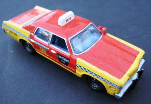 MINT 1974 DODGE ROYAL MONACO TAXI BY "JOHNNY LIGHTNING". NOT LESNEY OR DINKY.