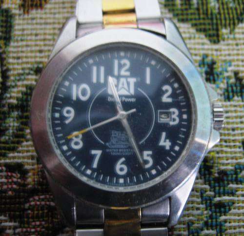 "CAT" DIESEL POWER MEN'S WRIST WATCH IN STAINLESS STEEL WITH STAINLESS STEEL WRISTBAND.