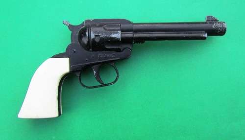 OLD DIE-CAST METAL "COLT" COWBOY CAP GUN WITH LEATHER HOLSTER. MADE IN ENGLAND IN THE SIXTIES.