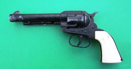 OLD DIE-CAST METAL "COLT" COWBOY CAP GUN WITH LEATHER HOLSTER. MADE IN ENGLAND IN THE SIXTIES.