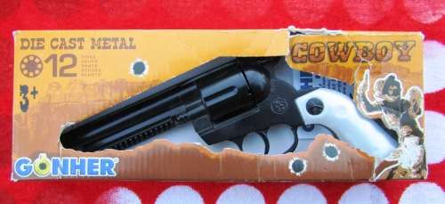 MINT AND BOXED DIE-CAST METAL "GONHER" "COLT" COWBOY CAP GUN . MADE IN SPAIN. FREE ROLLS OF CAPS.