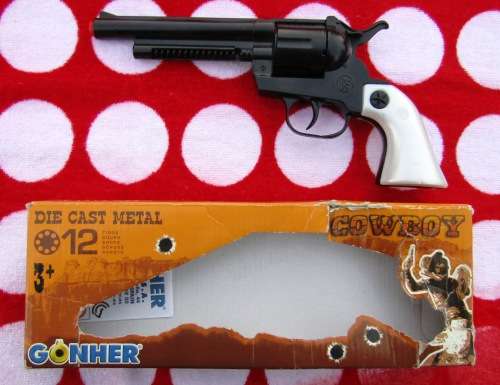MINT AND BOXED DIE-CAST METAL "GONHER" "COLT" COWBOY CAP GUN . MADE IN SPAIN. FREE ROLLS OF CAPS.