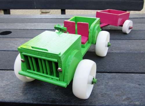 HAND MADE WOODEN `BARBIE` JEEP IN APPLE GREEN WITH TRAILER IN PINK. TOUGH STRUCTURE. NOT DINKY.