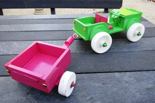 HAND MADE WOODEN `BARBIE` JEEP IN APPLE GREEN WITH TRAILER IN PINK. TOUGH STRUCTURE. NOT DINKY.