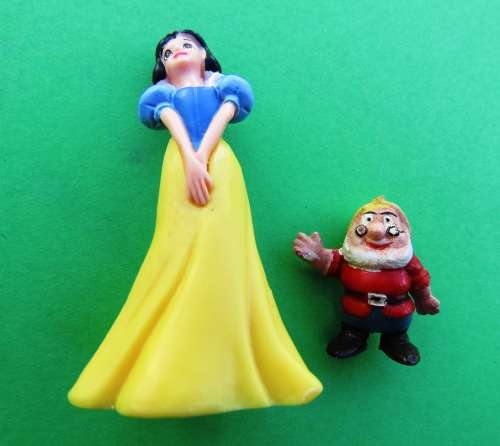 SCARCE `SNOW WHITE` AND `DOC` FIGURINES. DOC IS A GENUINE DISNEYKIN.