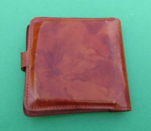 GENUINE LEATHER FOLDING CIGARETTE CASE FROM LONDON, ENGLAND.