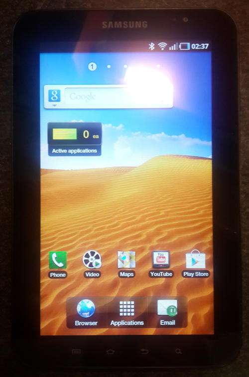 Samsung Galaxy Tab GT-P1000 with additional Flip-Cover, 2GB SD, Car Charger & RCA TV Cable