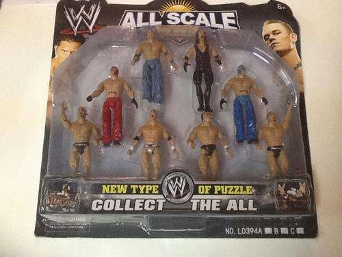 WWE all scale figurines +-9cm high - perfect for cake toppers 8 in pack