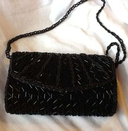 Black clutch handbag with sequence