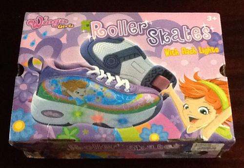 Roller skates for girls with flash lights - packaging taped, but new, from toys r us