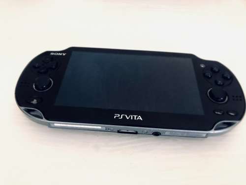 PS ViTA + Free Pouch + 100 Games + 128GB Memory Card