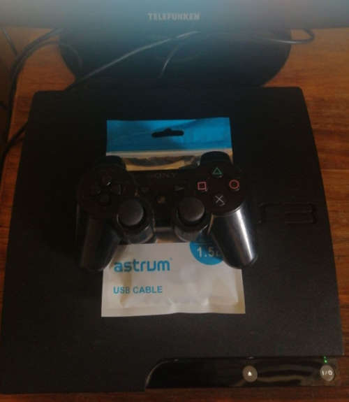 PS3 (HEN) INCLUDING 15 GAMES GTA V,UNCHARTED 2,FIFA19 and WWE 2K15 TO NAME A FEW.