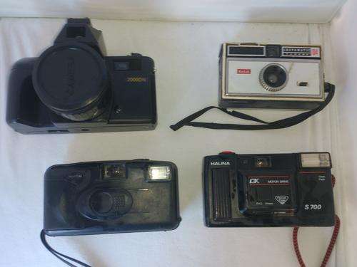 four vintage film cameras