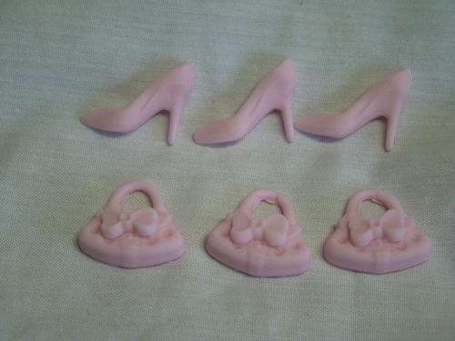 Edible pink shoes and handbags cake decorations