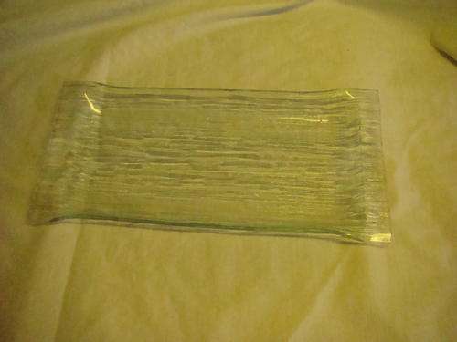 Slumped glass plate