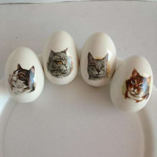 4 Hand made ceramic egg ornaments