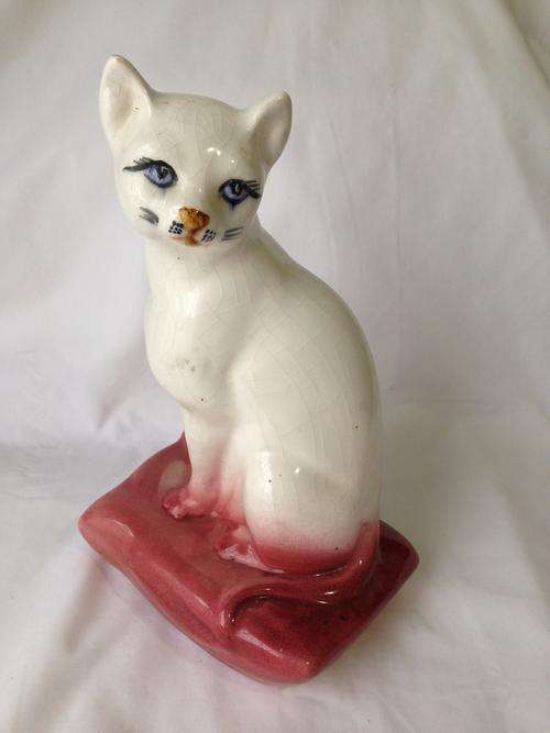 Vintage pink cat on cushion ornament