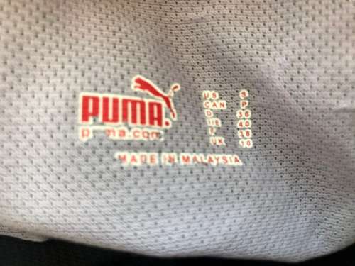 8 /32 to 10 / 34 ladies puma sports vest blue and purple.