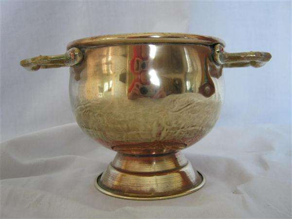 OLD BRASS FOOTED BOWL WITH HANDLES..MADE IN HOLLAND..10.50cm HIGH X 11cm ACROSS THE BOWL