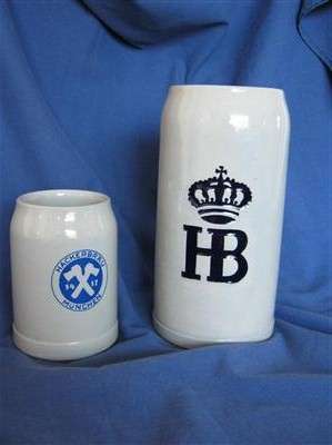 2 CERAMIC BEER TANKARDS.TALL ONE 20cm HIGH..1l & SHORT ONE 11.50cm HIGH. 0.25l
