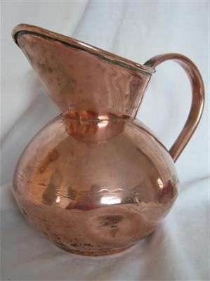 MEDIUM  COPPER JUG by DE KLERK OF SOUTH AFRICA..20.50cm HIGH ..54cm AROUND THE GIRTH...