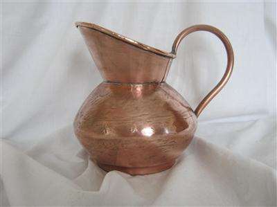SMALL COPPER JUG by DE KLERK ...17.50cm HIGH X 49.50cm AROUND THE GIRTH...