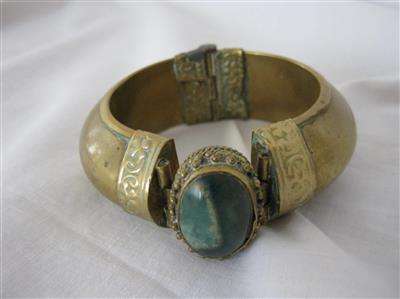 EASTERN SLIP ON BANGLE MADE OF HALLOW BRASS WITH STONE (JADE) ?