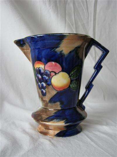 JUG by HOLINGSHEAD AND KIRKMAN of TUNSTALL. ENGLAND.. 16cm HIGH X 16cm ACROSS THE TOP