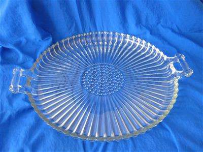 HEAVY GLASS SNACK TRAY.  MOULDED PATTERN..38cm HANDLE TO HANDLE...32cm ACROSS