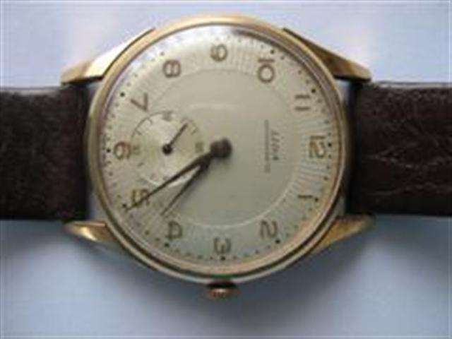 LIGA ANTIMAGNETIC GOLD PLATED WRISTWATCH WITH SECOND HAND FEATURE ON THE FACE..SWISS MADE