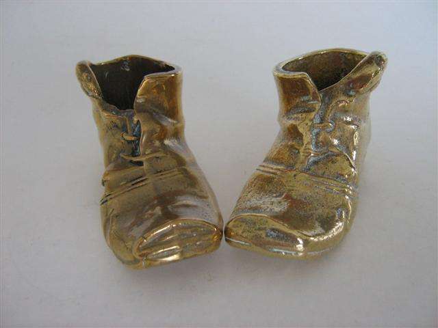 SOLID BRASS..PAIR OF " MOUSE BOOTS " MATCH HOLDERS AND MATCH STRIKER