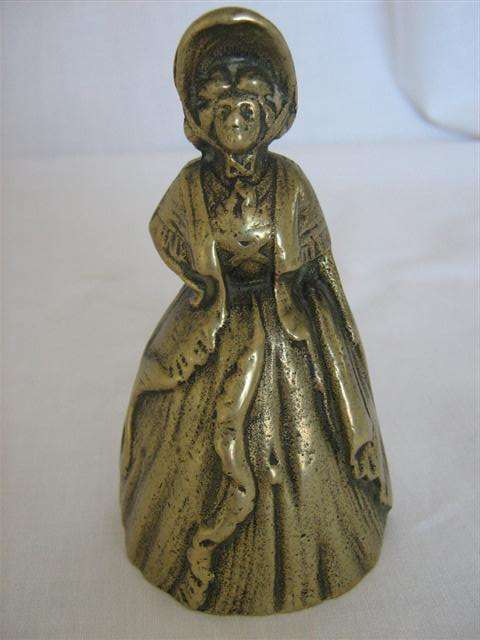OLD BRASS TABLE BELL..OF A LADY IN PERIOD DRESS AND BONNET