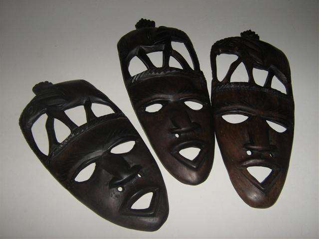 THREE HARD WOOD ETHNIC CARVED FACES