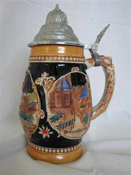 BEER STEIN...20.50cm HIGH.. X 8cm ACROSS BASE..MADE IN GERMANY...